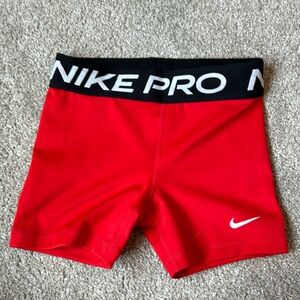 Red Nike Pros, Size M, 3”, worn once